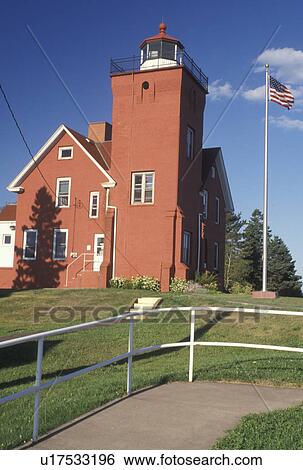 Stock Photograph -  lighthouse, MN, Two Harbors, Minnesota, Lake Superior, Two Harbors Lighthouse at Lighthouse Point and Harbor Museum in Two Harbors. . Fotosearch