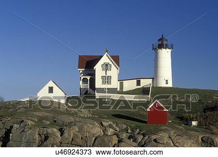 Stock Image -  lighthouse, York Harbor, ME, Maine, Nubble Light, Cape Neddick Light at York Harbor on the Atlantic Ocean. Fotosearch
