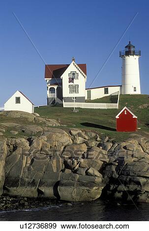 Stock Photo -  lighthouse, York Harbor, ME, Maine, Nubble Light, Cape Neddick Light at York Harbor on the Atlantic Ocean. Fotosearch