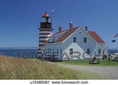 Lubec, lighthouse, ME, Maine, Bay of Fundy, West Quoddy Head Lighthouse at Quoddy Head State Park on the Atlantic Ocean. View Large Photo Image Stock Photo - Lubec, lighthouse, ME, Maine, Bay of Fundy, West Quoddy Head Lighthouse at Quoddy Head State Park on the Atlantic Ocean.. Fotosearch
