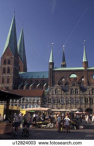 Lubeck, Germany, Schleswig-Holstein, Europe, Market day outside Marienkirche (church) at Markt in downtown Lubeck. View Large Photo Image Stock Image - Lubeck, Germany, Schleswig-Holstein, Europe, Market day outside Marienkirche (church) at Markt in downtown Lubeck.. Fotosearch