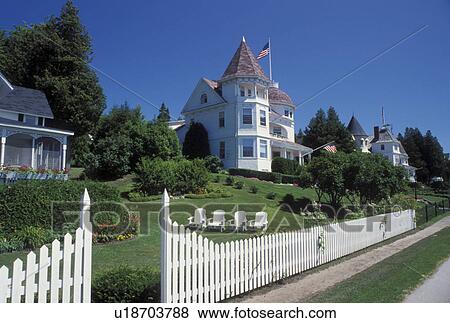 Mackinac Island, MI, Lake Huron, Michigan, Historic homes along West Bluff on Mackinac Island. View Large Photo Image Stock Photo - Mackinac Island, MI, Lake Huron, Michigan, Historic homes along West Bluff on Mackinac Island.. Fotosearch