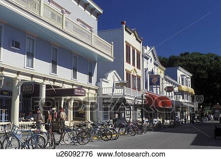 Stock Photograph -  Mackinac Island, MI, Lake Huron, Michigan, The Main Street downtown Mackinac Island on Lake Huron.. Fotosearch