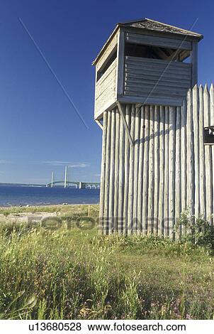 Mackinaw City, MI, Michigan, Fort Michilimackinac along the Straits of Mackinaw in Mackinaw City. View of Mackinac Bridge crossing the Straits of Mackinaw. View Large Photo Image Stock Photo - Mackinaw City, MI, Michigan, Fort Michilimackinac along the Straits of Mackinaw in Mackinaw City. View of Mackinac Bridge crossing the Straits of Mackinaw.. Fotosearch
