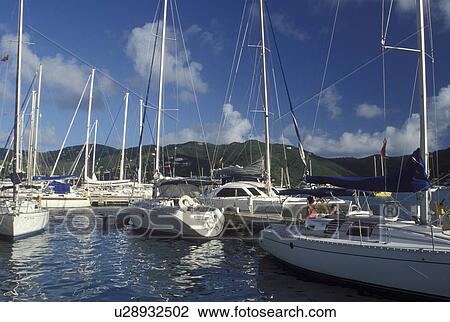 Stock Image -  marina, Caribbean, Tortola, British Virgin Islands, Road Town, BVI, Boats docked at a yacht club on the Caribbean Sea on the island of Tortola.. Fotosearch