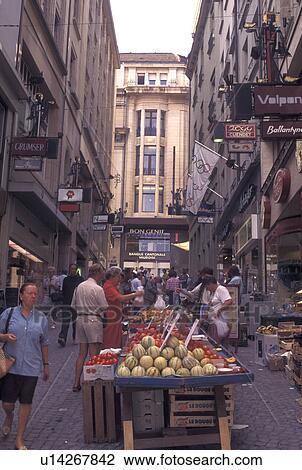 Stock Image -  market day, Switzerland, Lausanne, Vaud, Outdoor market in the city of Lausanne.. Fotosearch