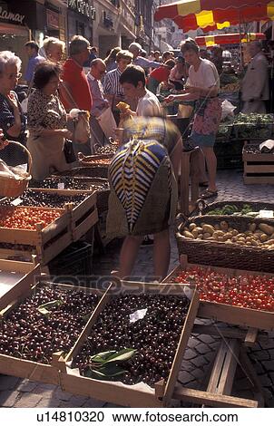 Stock Image -  market day, Switzerland, Lausanne, Vaud, Produce for sale at the open air market in the city of Lausanne.. Fotosearch