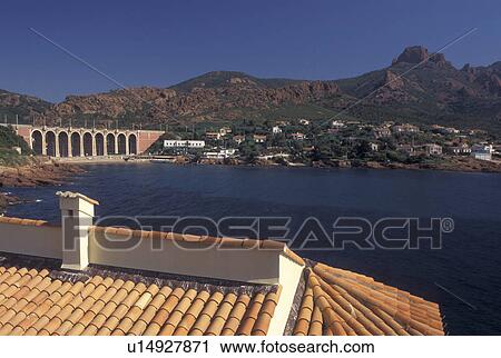Massif de l' Esterel, Cote d' Azur, Provence, France, Var, Europe, Scenic view of Corniche de l' Esterel, red rocky coast, on the Mediterranean Sea. View Large Photo Image Stock Image - Massif de l' Esterel, Cote d' Azur, Provence, France, Var, Europe, Scenic view of Corniche de l' Esterel, red rocky coast, on the Mediterranean Sea.. Fotosearch