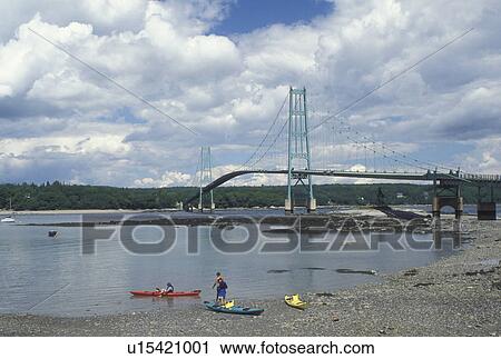 ME, Deer Isle, Maine, Sea kayaking near Deer Isle Bridge on Penobscot Bay on the Atlantic Ocean. View Large Photo Image Stock Image - ME, Deer Isle, Maine, Sea kayaking near Deer Isle Bridge on Penobscot Bay on the Atlantic Ocean.. Fotosearch