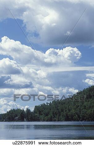 ME, Green Lake, Maine, Scenic view of cumulus clouds over Green Lake. View Large Photo Image Stock Image - ME, Green Lake, Maine, Scenic view of cumulus clouds over Green Lake.. Fotosearch