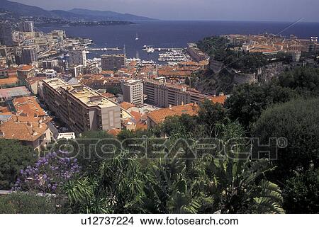 Monaco, Aerial view of Monaco Harbor in the district of La Condamine in the Principality of Monaco along the Mediterranean Sea. View Large Photo Image Picture - Monaco, Aerial view of Monaco Harbor in the district of La Condamine in the Principality of Monaco along the Mediterranean Sea.. Fotosearch