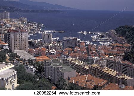 Monaco, Aerial view of Monaco Harbor in the district of La Condamine in the Principality of Monaco along the Mediterranean Sea. View Large Photo Image Picture - Monaco, Aerial view of Monaco Harbor in the district of La Condamine in the Principality of Monaco along the Mediterranean Sea.. Fotosearch