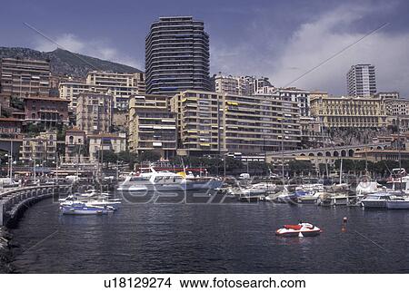 Monaco, Boats docked in Monaco Harbor in the district of La Condamine in the Principality of Monaco along the Mediterranean Sea. View Large Photo Image Picture - Monaco, Boats docked in Monaco Harbor in the district of La Condamine in the Principality of Monaco along the Mediterranean Sea.. Fotosearch