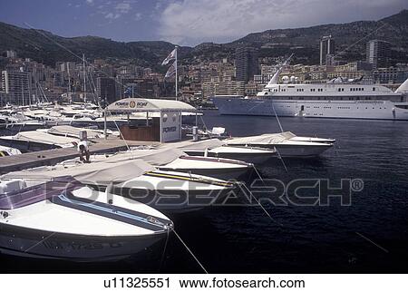 Monaco, Boats docked in Monaco Harbor in the district of La Condamine in the Principality of Monaco along the Mediterranean Sea. View Large Photo Image Stock Image - Monaco, Boats docked in Monaco Harbor in the district of La Condamine in the Principality of Monaco along the Mediterranean Sea.. Fotosearch