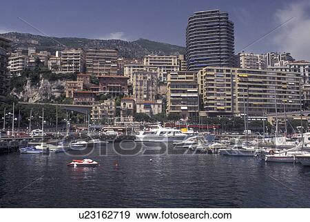 Monaco, Boats docked in Monaco Harbor in the district of La Condamine in the Principality of Monaco along the Mediterranean Sea. View Large Photo Image Stock Photo - Monaco, Boats docked in Monaco Harbor in the district of La Condamine in the Principality of Monaco along the Mediterranean Sea.. Fotosearch