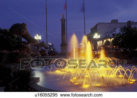 Montreal, Canada, Quebec, Fountain at Place Vauquelin in the evening in Old Montreal (Vieux Montreal) in Quebec. View Large Photo Image Stock Photography - Montreal, Canada, Quebec, Fountain at Place Vauquelin in the evening in Old Montreal (Vieux Montreal) in Quebec.. Fotosearch
