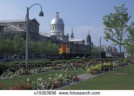 Montreal, Canada, Quebec, Marche Bonsecours, Gardens and an old train displayed outside Bonsecours Market at the Old Port (Vieux Port) in Old Montreal (Vieux Montreal) in Quebec. View Large Photo Image Stock Photograph - Montreal, Canada, Quebec, Marche Bonsecours, Gardens and an old train displayed outside Bonsecours Market at the Old Port (Vieux Port) in Old Montreal (Vieux Montreal) in Quebec.. Fotosearch