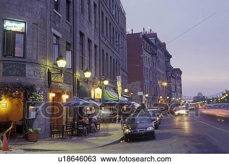 Montreal, Canada, Quebec, Outdoor cafTs and shops along the street at the Old Port (Vieux Port) at night in Old Montreal (Vieux Montreal) in Quebec. View Large Photo Image Stock Image - Montreal, Canada, Quebec, Outdoor cafTs and shops along the street at the Old Port (Vieux Port) at night in Old Montreal (Vieux Montreal) in Quebec.. Fotosearch