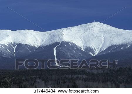 Picture -  Mount Washington, Bretton Woods, NH, New Hampshire, Scenic view of the Presidential Range on Mt. Washington in the White Mountain National Forest in the winter.. Fotosearch