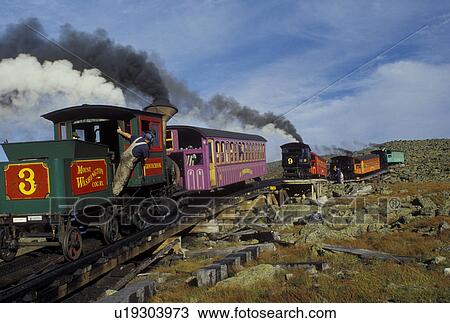 Mount Washington, NH, Breton Woods, White Mountain National Forest, New Hampshire, Mt. Washington Cog Railway trains carry passengers to the summit of Mount Washington in the White Mountain Nat'l Forest. View Large Photo Image Stock Image - Mount Washington, NH, Breton Woods, White Mountain National Forest, New Hampshire, Mt. Washington Cog Railway trains carry passengers to the summit of Mount Washington in the White Mountain Nat'l Forest.. Fotosearch