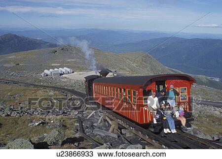 Mount Washington, NH, Breton Woods, White Mountain National Forest, New Hampshire, Mt. Washington Cog Railway train carries passengers to the summit of Mount Washington in the White Mountain Nat'l Forest. View Large Photo Image Stock Image - Mount Washington, NH, Breton Woods, White Mountain National Forest, New Hampshire, Mt. Washington Cog Railway train carries passengers to the summit of Mount Washington in the White Mountain Nat'l Forest.. Fotosearch