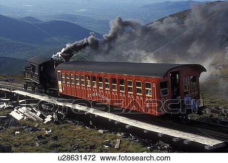 Mount Washington, NH, Breton Woods, White Mountain National Forest, New Hampshire, Mt. Washington Cog Railway train carries passengers to the summit of Mount Washington in the White Mountain Nat'l Forest. View Large Photo Image Stock Image - Mount Washington, NH, Breton Woods, White Mountain National Forest, New Hampshire, Mt. Washington Cog Railway train carries passengers to the summit of Mount Washington in the White Mountain Nat'l Forest.. Fotosearch
