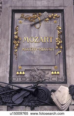 Stock Photography -  Mozart, Vienna, Austria, Wien, Gold inscription on Wolfgang Amadeus Mozart Monument in Burggarten. Fotosearch