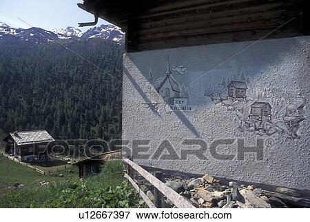 mural, Switzerland, Valais, Alps, Findeln, Painting on the side of a chalet in the mountain village of Findeln above Zermatt in the Swiss Alps. View Large Photo Image Stock Photo - mural, Switzerland, Valais, Alps, Findeln, Painting on the side of a chalet in the mountain village of Findeln above Zermatt in the Swiss Alps.. Fotosearch