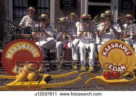 musicians, Holland, Edam, Netherlands, Noord-Holland, Europe, The Edam Band plays outside cheese market on market day in the city of Edam. View Large Photo Image Stock Image - musicians, Holland, Edam, Netherlands, Noord-Holland, Europe, The Edam Band plays outside cheese market on market day in the city of Edam.. Fotosearch
