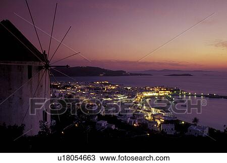 Mykonos, Cyclades, Greece, Greek Islands, Europe, Windmill overlooking the scenic Harbor of Mykonos at sunset on the Aegean Sea. View Large Photo Image Stock Image - Mykonos, Cyclades, Greece, Greek Islands, Europe, Windmill overlooking the scenic Harbor of Mykonos at sunset on the Aegean Sea.. Fotosearch