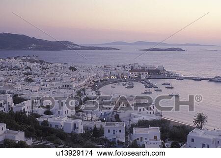 Mykonos, Greece, Greek Islands, Cyclades, Europe, Scenic view of Mykonos Harbor in the evening on the Aegean Sea. View Large Photo Image Picture - Mykonos, Greece, Greek Islands, Cyclades, Europe, Scenic view of Mykonos Harbor in the evening on the Aegean Sea.. Fotosearch