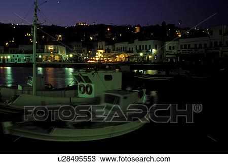 Mykonos, Greece, Greek Islands, Cyclades, Europe, Fishing boats buoyed in Mykonos Harbor in the evening on the Aegean Sea. View Large Photo Image Stock Image - Mykonos, Greece, Greek Islands, Cyclades, Europe, Fishing boats buoyed in Mykonos Harbor in the evening on the Aegean Sea.. Fotosearch