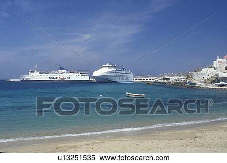 Mykonos, Greece, Greek Islands, Cyclades, Europe, Ferries docked in the harbor on Mykonos Island on the Aegean Sea. View Large Photo Image Stock Photography - Mykonos, Greece, Greek Islands, Cyclades, Europe, Ferries docked in the harbor on Mykonos Island on the Aegean Sea.. Fotosearch