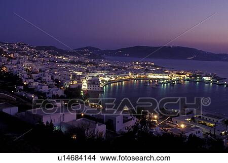 Mykonos, Greek Islands, Cyclades, Greece, Europe, Scenic view of Mykonos Harbor in the evening on the Aegean Sea. View Large Photo Image Picture - Mykonos, Greek Islands, Cyclades, Greece, Europe, Scenic view of Mykonos Harbor in the evening on the Aegean Sea.. Fotosearch