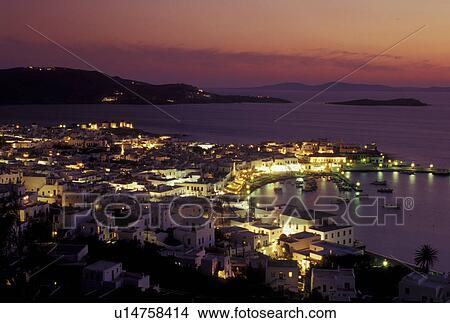 Mykonos, Greek Islands, Cyclades, Greece, Europe, Scenic view of Mykonos Harbor in the evening on the Aegean Sea. View Large Photo Image Picture - Mykonos, Greek Islands, Cyclades, Greece, Europe, Scenic view of Mykonos Harbor in the evening on the Aegean Sea.. Fotosearch