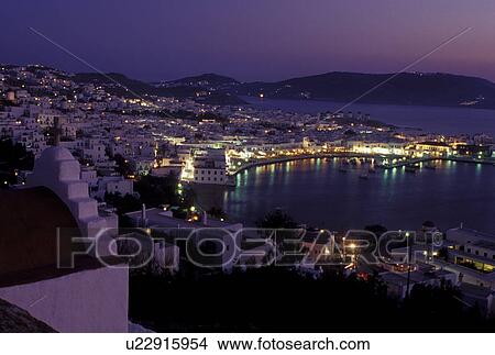 Mykonos, Greek Islands, Cyclades, Greece, Europe, Scenic view of Mykonos Harbor in the evening on the Aegean Sea. View Large Photo Image Picture - Mykonos, Greek Islands, Cyclades, Greece, Europe, Scenic view of Mykonos Harbor in the evening on the Aegean Sea.. Fotosearch