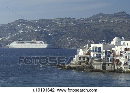 Mykonos, Greek Islands, Cyclades, Greece, Europe, Cruise ship docked in Mykonos Harbor and the waterfront on the Aegean Sea. View Large Photo Image Stock Image - Mykonos, Greek Islands, Cyclades, Greece, Europe, Cruise ship docked in Mykonos Harbor and the waterfront on the Aegean Sea.. Fotosearch