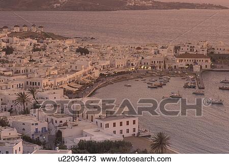 Mykonos, Greek Islands, Cyclades, Greece, Europe, Scenic view of Mykonos Harbor in the evening on the Aegean Sea. View Large Photo Image Stock Image - Mykonos, Greek Islands, Cyclades, Greece, Europe, Scenic view of Mykonos Harbor in the evening on the Aegean Sea.. Fotosearch