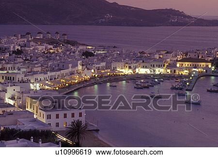 Mykonos, Greek Islands, Cyclades, Greece, Europe, Scenic view of Mykonos Harbor in the evening on the Aegean Sea. View Large Photo Image Stock Photo - Mykonos, Greek Islands, Cyclades, Greece, Europe, Scenic view of Mykonos Harbor in the evening on the Aegean Sea.. Fotosearch