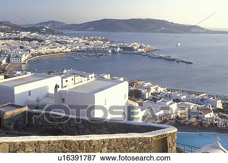 Mykonos, Greek Islands, Cyclades, Greece, Europe, Resort with swimming pool and view of Mykonos Harbor on the Aegean Sea. View Large Photo Image Stock Photo - Mykonos, Greek Islands, Cyclades, Greece, Europe, Resort with swimming pool and view of Mykonos Harbor on the Aegean Sea.. Fotosearch