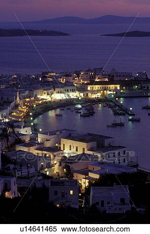 Stock Photography -  Mykonos, Greek Islands, Cyclades, Greece, Europe, Scenic view of Mykonos Harbor in the evening on the Aegean Sea.. Fotosearch