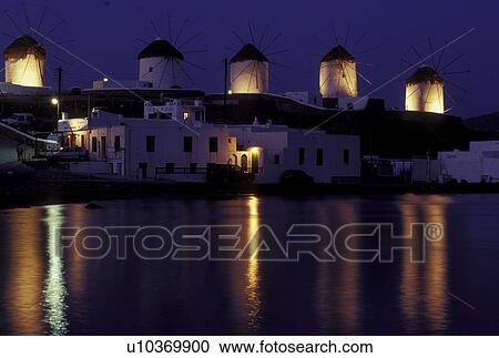 Mykonos, windmills, Greek Islands, Cyclades, Greece, Europe, Windmills along the waterfront of Mykonos in the evening on the Aegean Sea. View Large Photo Image Stock Image - Mykonos, windmills, Greek Islands, Cyclades, Greece, Europe, Windmills along the waterfront of Mykonos in the evening on the Aegean Sea.. Fotosearch