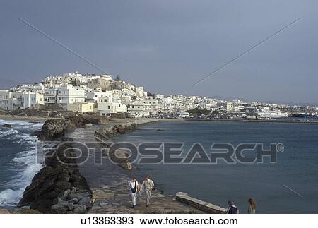 Naxos, Greece, Greek Islands, Cyclades, Europe, Scenic view of Hora Naxos and the causeway from the islet of Palatia on Naxos Island on the Aegean Sea. View Large Photo Image Stock Image - Naxos, Greece, Greek Islands, Cyclades, Europe, Scenic view of Hora Naxos and the causeway from the islet of Palatia on Naxos Island on the Aegean Sea.. Fotosearch