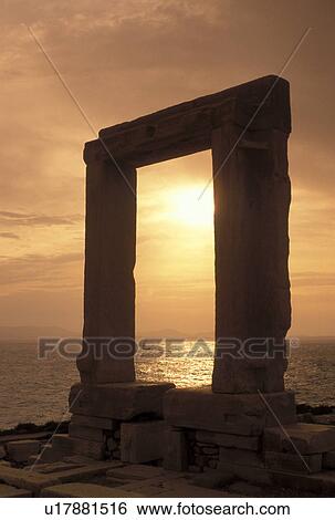 Stock Photograph -  Naxos, Greece, Greek Islands, Cyclades, Europe, Temple of Apollo on Naxos Island at sunset on the Aegean Sea.. Fotosearch