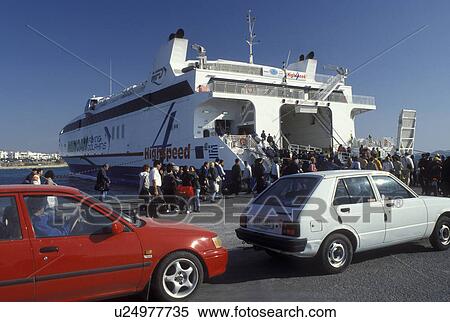 Stock Photography -  Naxos, Greek Islands, Cyclades, Greece, Europe, Ferry loading cars and passengers in Hora Naxos Harbor on Naxos Island on the Aegean Sea.. Fotosearch