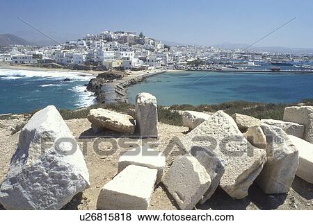 Naxos, Greek Islands, Greece, Cyclades, Europe, Scenic view of Hora Naxos and the causeway from the islet of Palatia and the Temple of Apollo on Naxos Island on the Aegean Sea. View Large Photo Image Stock Photo - Naxos, Greek Islands, Greece, Cyclades, Europe, Scenic view of Hora Naxos and the causeway from the islet of Palatia and the Temple of Apollo on Naxos Island on the Aegean Sea.. Fotosearch
