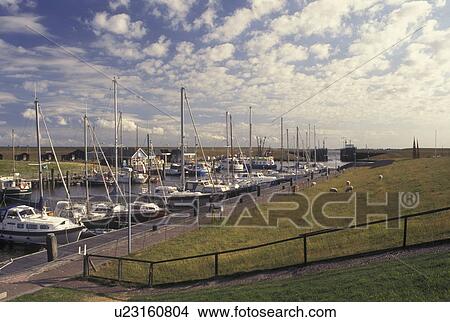 Netherlands, Holland, Groningen, Termunten, Europe, Boats docked in the harbor on the North Sea in Termunten. View Large Photo Image Picture - Netherlands, Holland, Groningen, Termunten, Europe, Boats docked in the harbor on the North Sea in Termunten.. Fotosearch