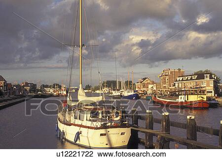Netherlands, Holland, Groningen, Delfzijl, North Sea, Europe, Boats docked along the harbor of Delfzijl on the North Sea. View Large Photo Image Stock Image - Netherlands, Holland, Groningen, Delfzijl, North Sea, Europe, Boats docked along the harbor of Delfzijl on the North Sea.. Fotosearch