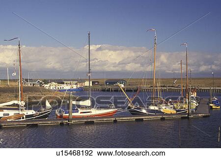 Netherlands, Holland, Groningen, Termunten, Europe, Boats docked in the harbor on the North Sea in Termunten. View Large Photo Image Stock Image - Netherlands, Holland, Groningen, Termunten, Europe, Boats docked in the harbor on the North Sea in Termunten.. Fotosearch
