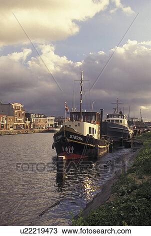 Netherlands, Holland, Groningen, Delfzijl, North Sea, Europe, Boats docked along the harbor of Delfzijl on the North Sea. View Large Photo Image Stock Image - Netherlands, Holland, Groningen, Delfzijl, North Sea, Europe, Boats docked along the harbor of Delfzijl on the North Sea.. Fotosearch